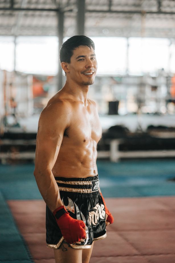 Lewis Tan's Cole Young looks like Johnny Cage on Mortal Kombat set.