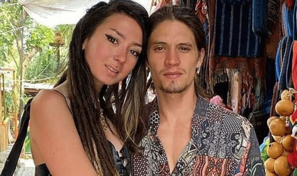 With her, also deceased, boyfriend