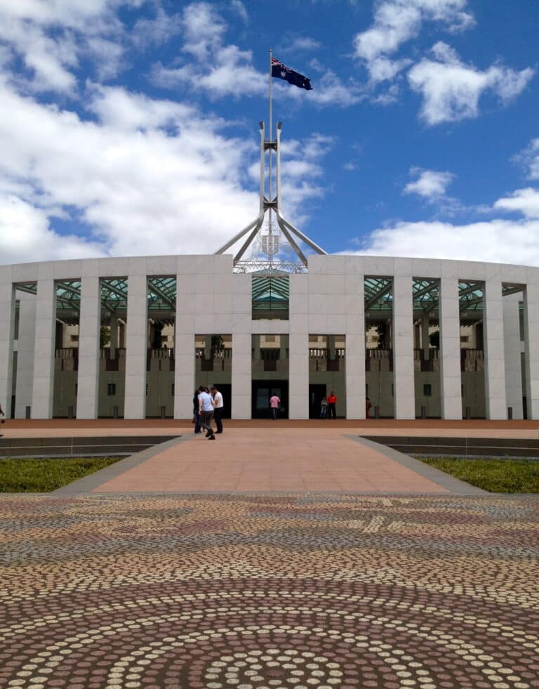 Australian Parliament House in Canberra, where national governments set shared policy expectations