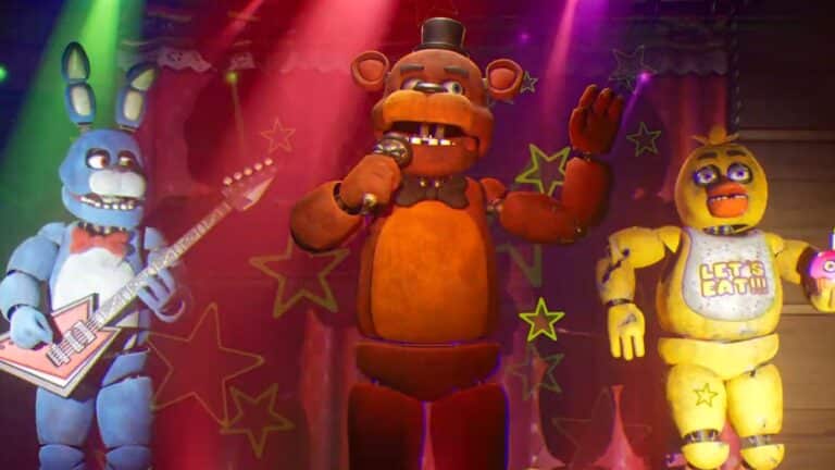 Freddy Fazbear, Bonnie and Chica performing on a colourful stage
