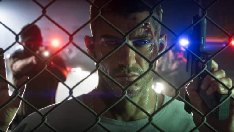 Jason Duval behind a wire fence with police lights in an official GTA VI screenshot