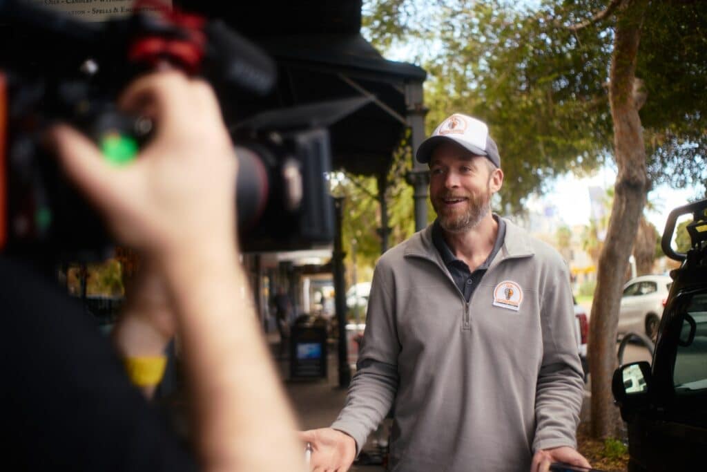Hamish Blake speaking to camera while filming Unskilled Adult