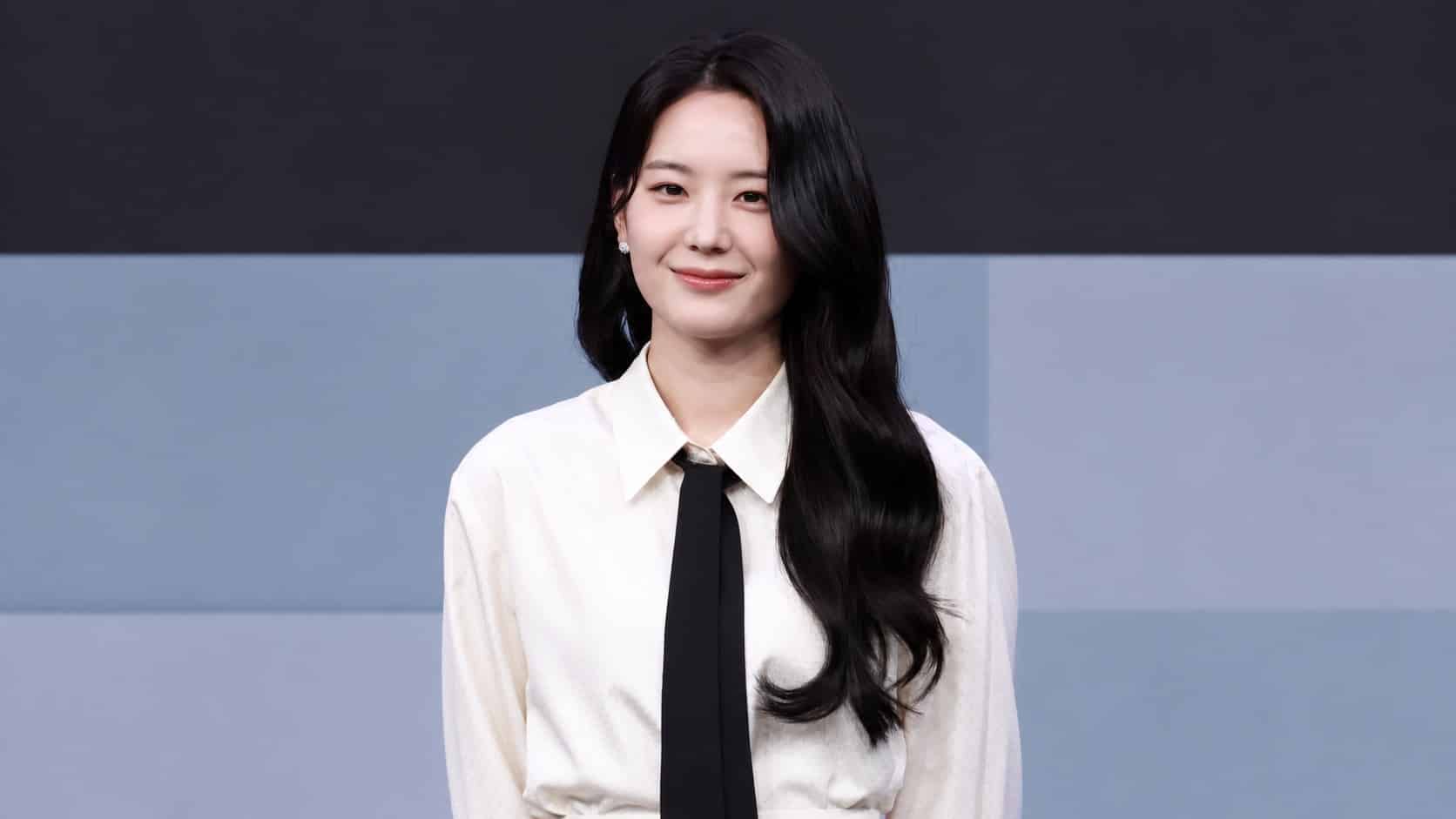 Jang Gyu-ri at a 2024 public event, in a landscape portrait with extended backdrop