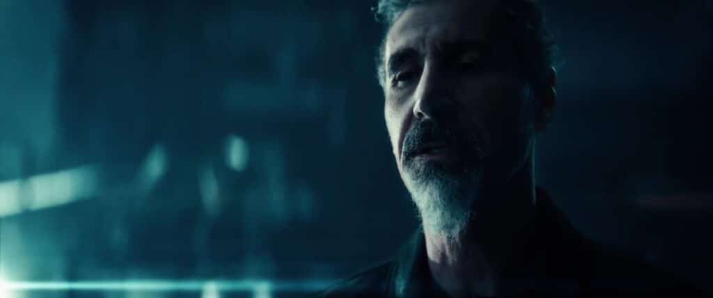 Serj Tankian appears in a blue-lit close-up in the Joseph music video