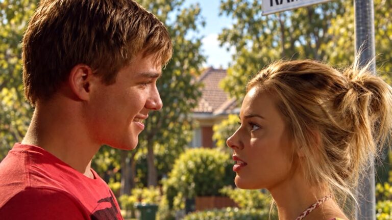 Margot Robbie as Donna Freedman faces Sam Clark as Ringo Brown on Ramsay Street