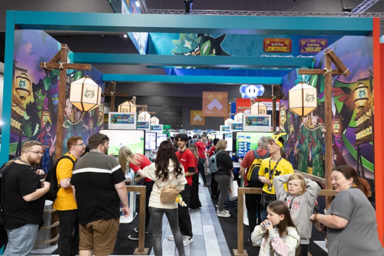 Crowds gather around a colourful Pokémon booth on the PAX Australia expo floor