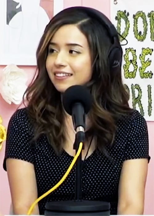Pokimane speaking on a podcast in 2019