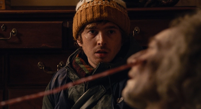 Austin Abrams in a tense scene from Resident Evil 2026