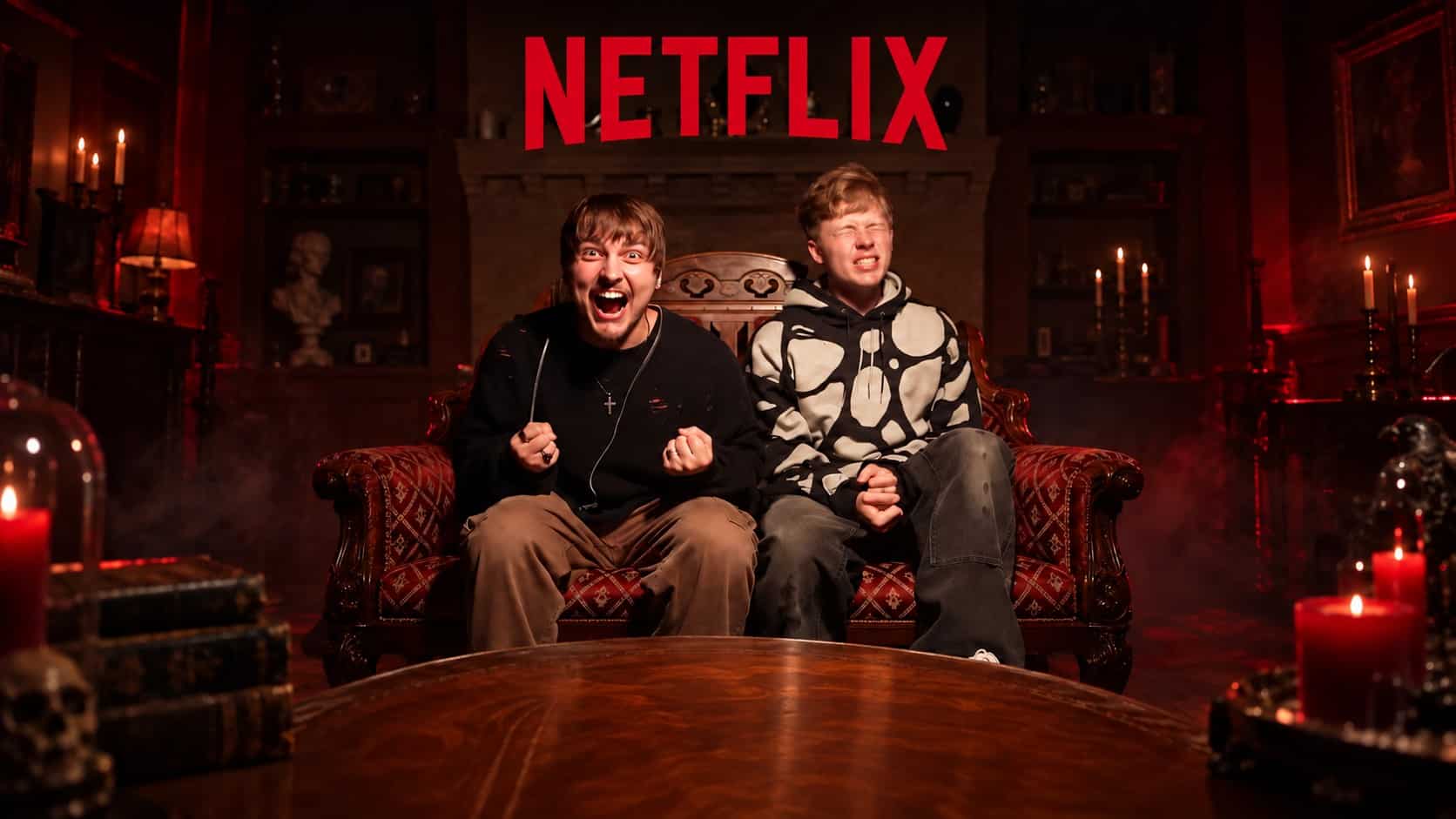 Sam Golbach and Colby Brock celebrate their Netflix announcement in a dark paranormal setting