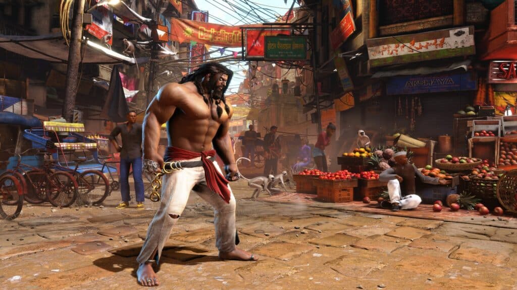 Arjun stands in an Indian market stage in Street Fighter 6.