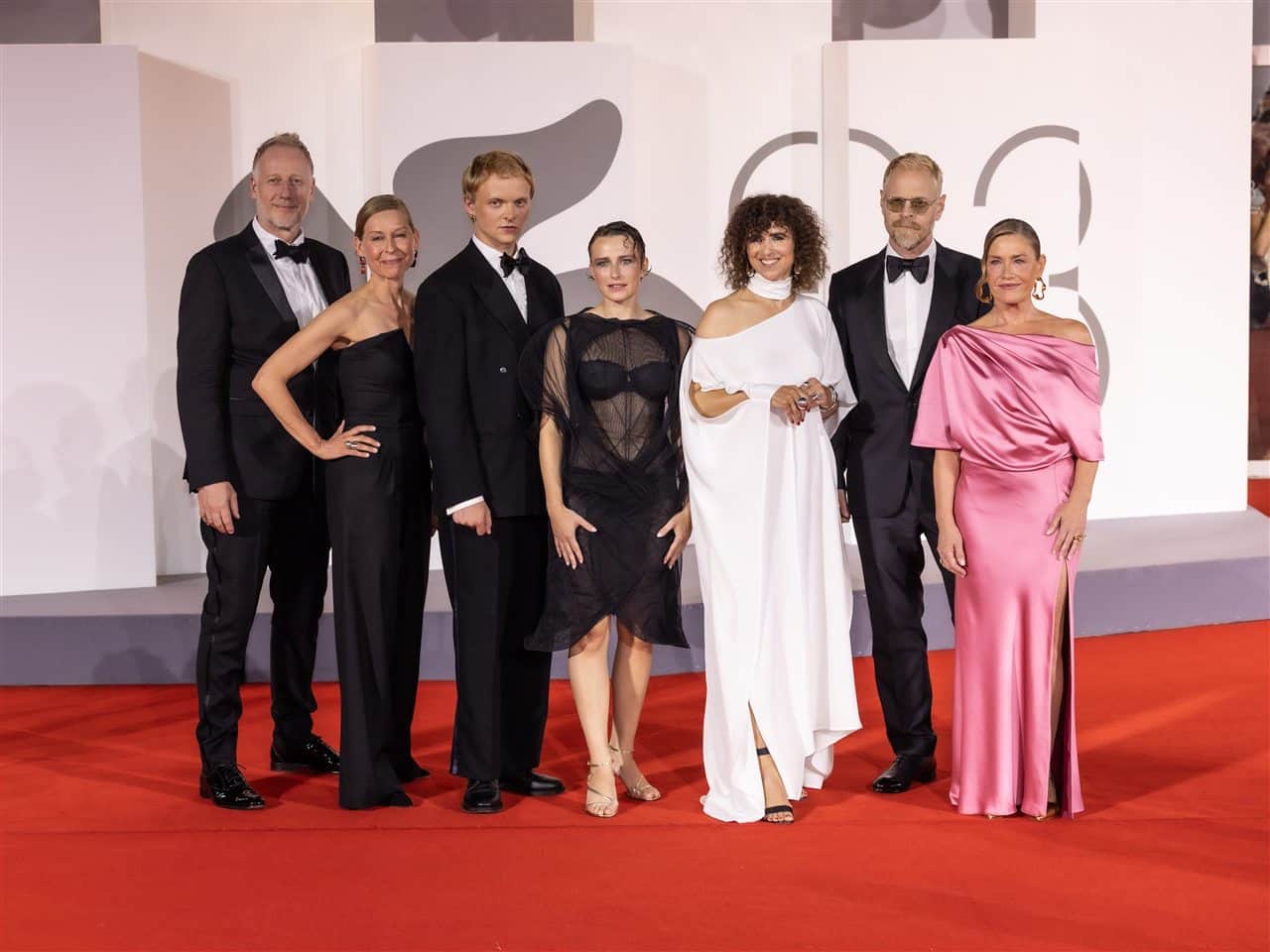 The cast and director of Woman Unknown at Venice.