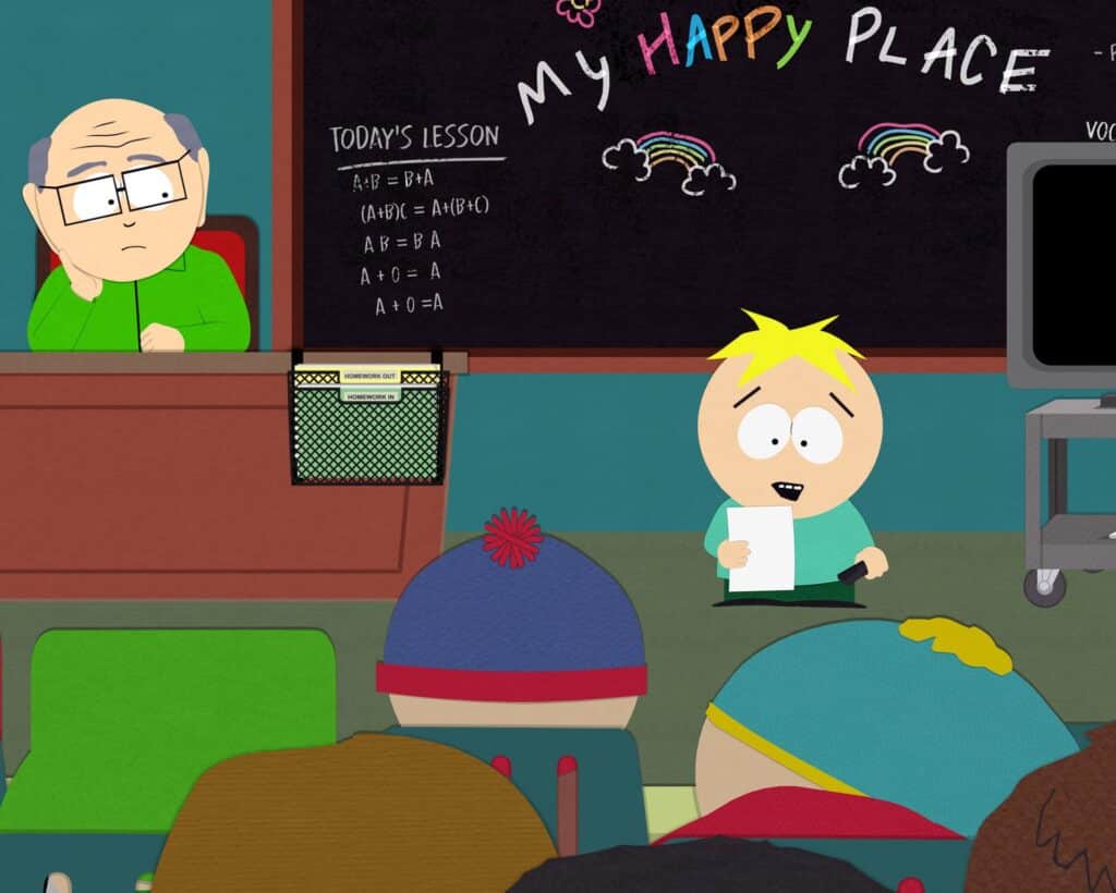 Butters presenting his happy place assignment in a South Park classroom