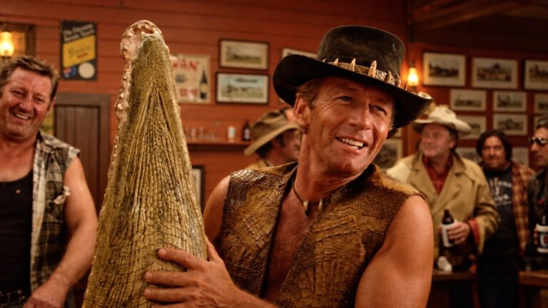 Paul Hogan as Mick Dundee in the Walkabout Creek pub