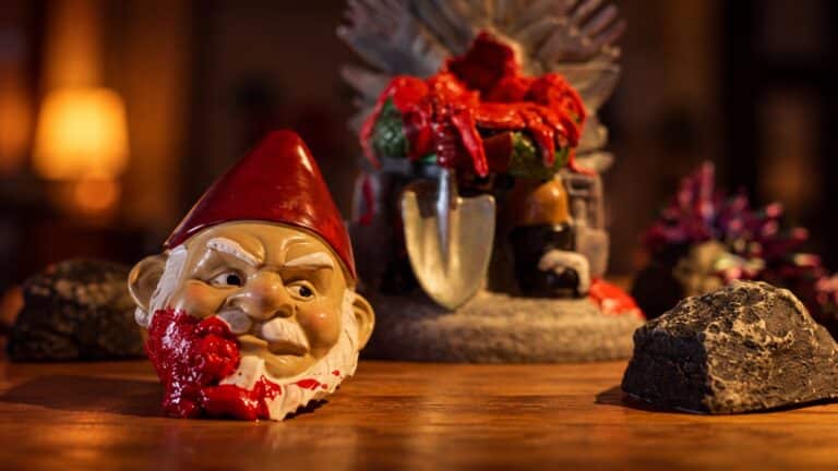 A blood-spattered red-hatted garden gnome prop from the Stan horror comedy Gnomes