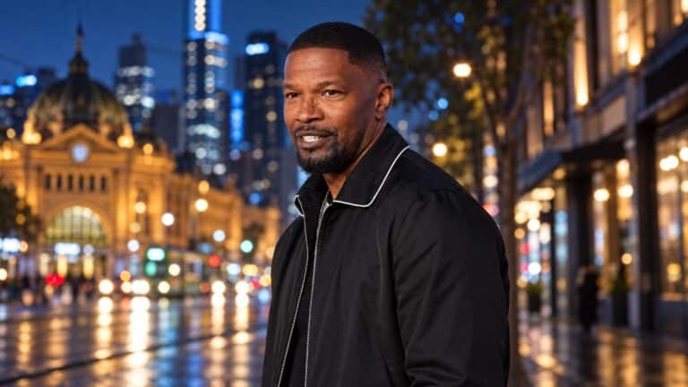 Jamie Foxx against a softly lit Melbourne streetscape at night