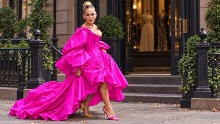 Sarah Jessica Parker in a vivid pink gown on a New York street